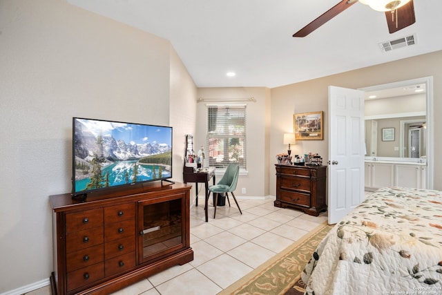 tiled bedroom featuring ceiling fan