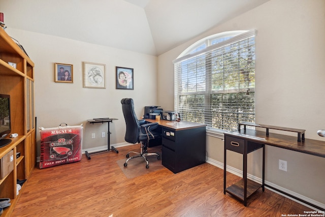 5018 Italica Rd, San Antonio, TX 78253 - home office with baseboards, vaulted ceiling, and light wood finished floors