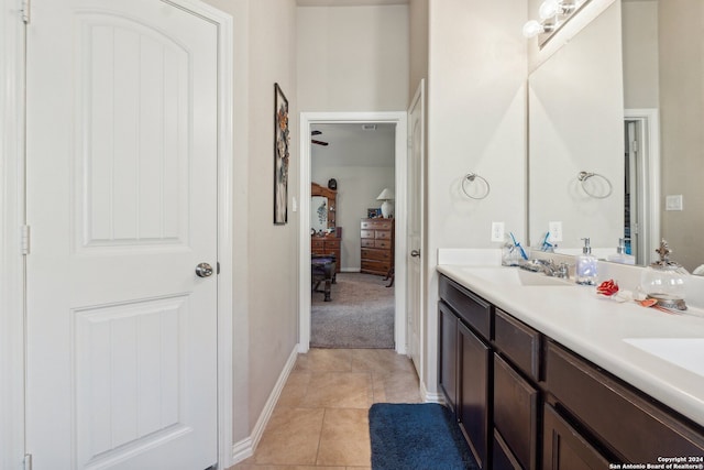 5018 Italica Rd, San Antonio, TX 78253 - ensuite bathroom with double vanity, tile patterned flooring, a sink, baseboards, and ensuite bath