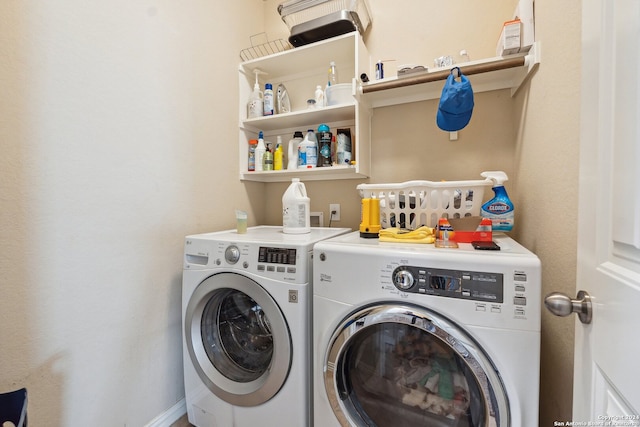 washroom with independent washer and dryer