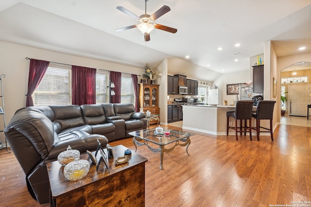 5018 Italica Rd, San Antonio, TX 78253 - living room featuring ceiling fan, vaulted ceiling, and light wood-style floors