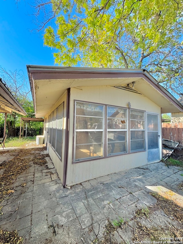 view of home's exterior featuring a patio