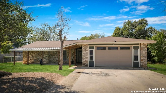 ranch-style home with a front lawn and a garage