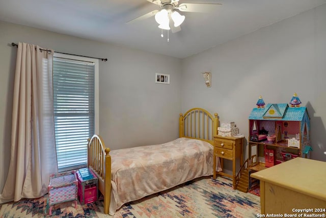 bedroom featuring ceiling fan