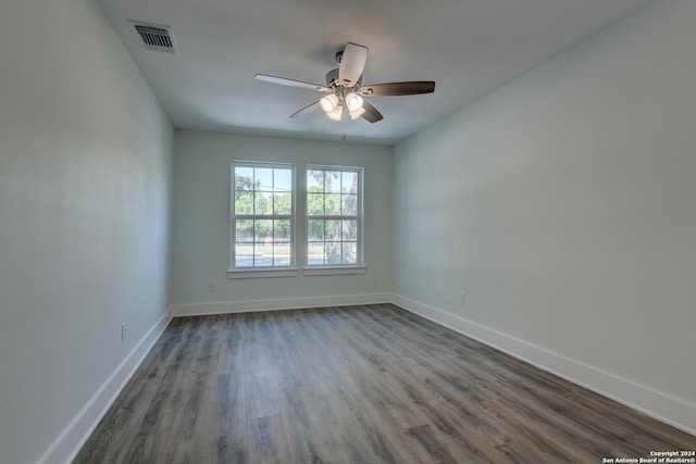 2293 W Mill St, New Braunfels, TX 78130 - unfurnished room with a ceiling fan, baseboards, and dark wood finished floors