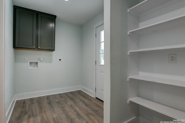 2293 W Mill St, New Braunfels, TX 78130 - laundry area with electric dryer hookup, hookup for a washing machine, cabinet space, dark wood-type flooring, and baseboards