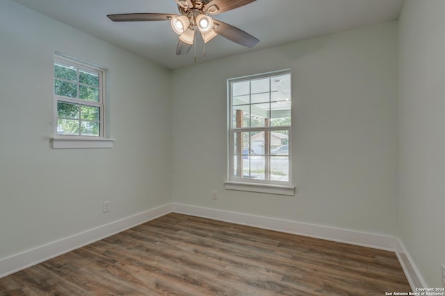 2293 W Mill St, New Braunfels, TX 78130 - empty room with baseboards, wood finished floors, and ceiling fan