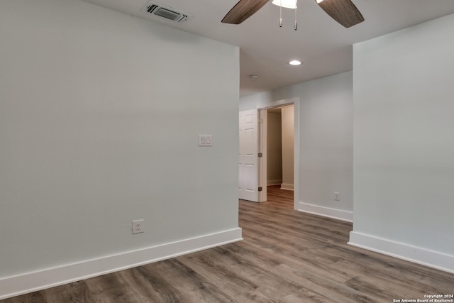 2293 W Mill St, New Braunfels, TX 78130 - empty room with baseboards, a ceiling fan, dark wood finished floors, and recessed lighting