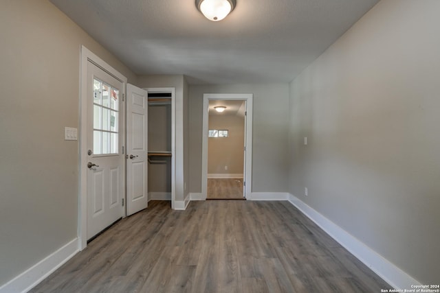 2293 W Mill St, New Braunfels, TX 78130 - entrance foyer with wood finished floors and baseboards