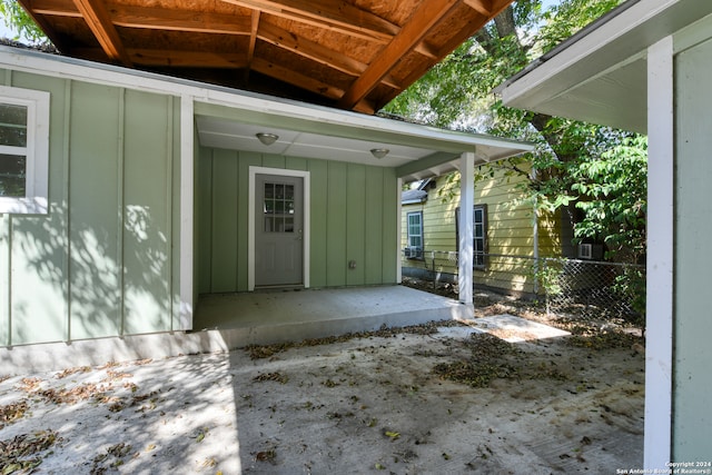 entrance to property featuring a patio area