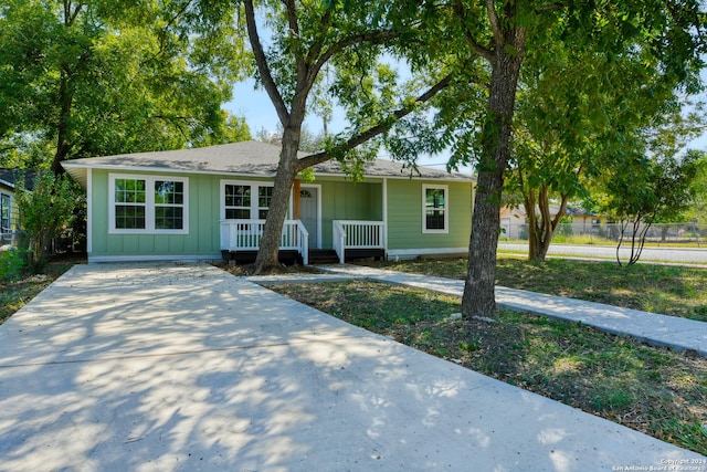 2293 W Mill St, New Braunfels, TX 78130 - view of front facade with a porch and board and batten siding