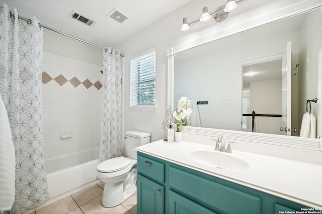 full bathroom featuring tile patterned flooring, shower / bath combo, vanity, and toilet