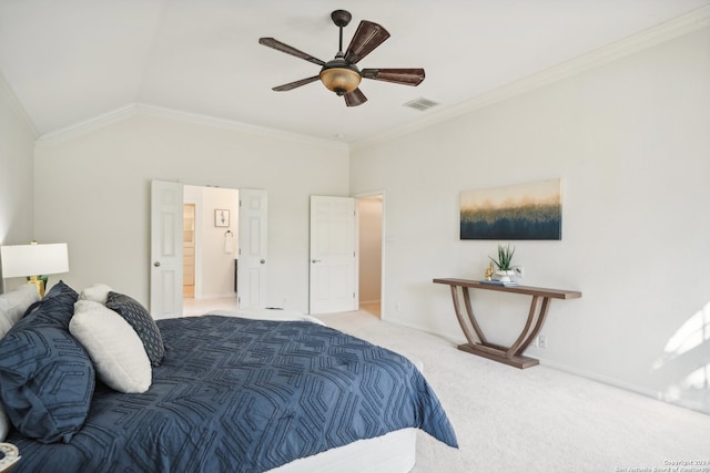 carpeted bedroom featuring crown molding, vaulted ceiling, and ceiling fan