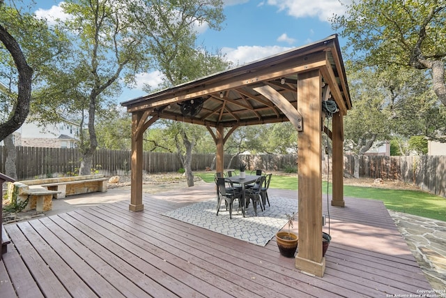 deck with a gazebo and a lawn