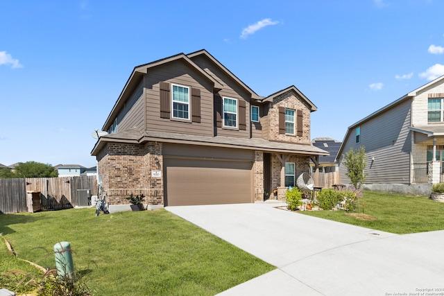 craftsman-style house featuring central AC unit, a garage, and a front yard