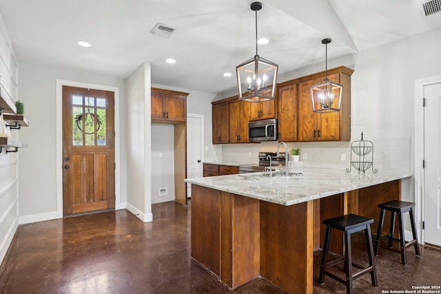 kitchen with decorative light fixtures, light stone counters, sink, stainless steel appliances, and kitchen peninsula