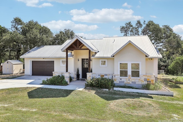 modern farmhouse with a garage and a front yard