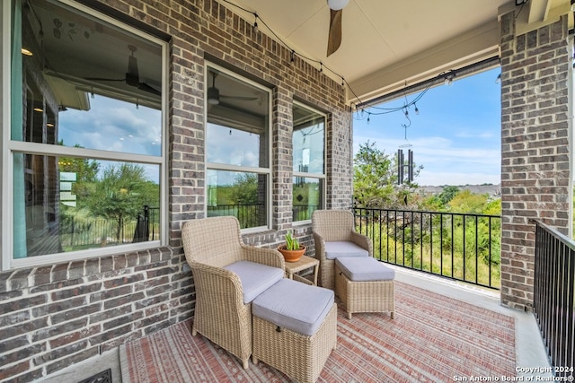 balcony featuring ceiling fan