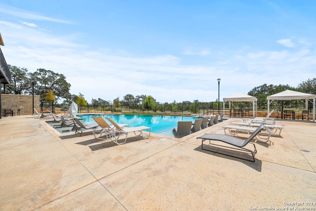 view of pool featuring a patio area