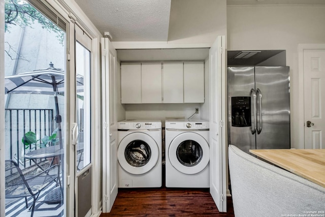 clothes washing area with cabinets, separate washer and dryer, dark wood-type flooring, and a textured ceiling