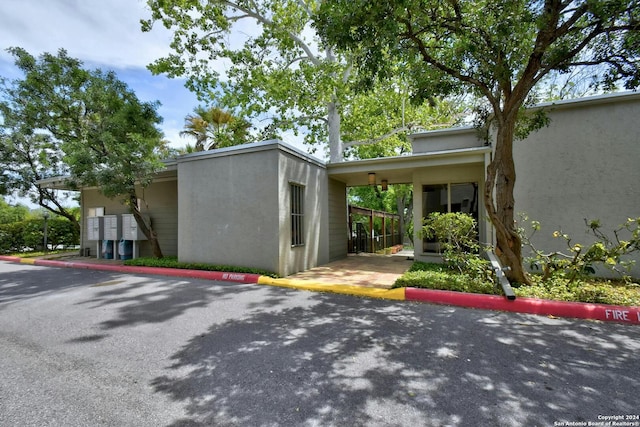 view of home's exterior with mail boxes