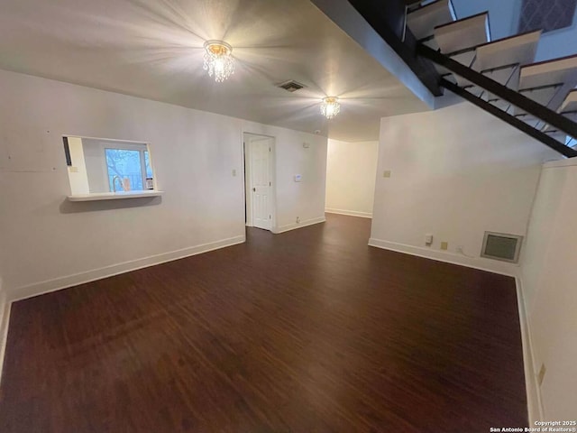 basement featuring dark wood-type flooring