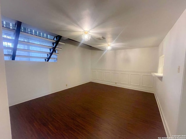 empty room featuring dark wood-type flooring