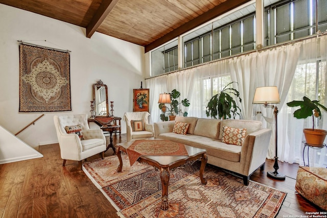 living room with beam ceiling, plenty of natural light, wooden ceiling, and hardwood / wood-style flooring