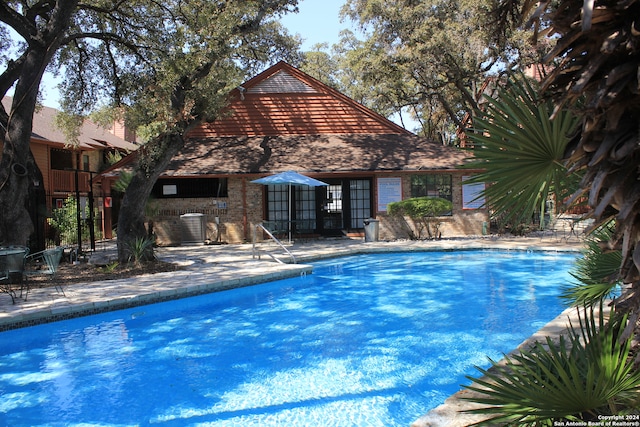 view of pool with a patio area