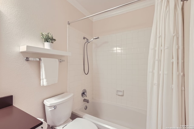 bathroom with shower / tub combo, toilet, and crown molding