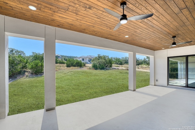 view of patio featuring ceiling fan