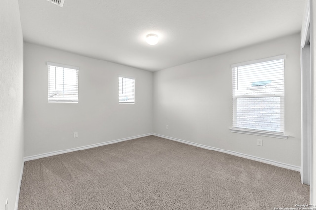 view of carpeted spare room