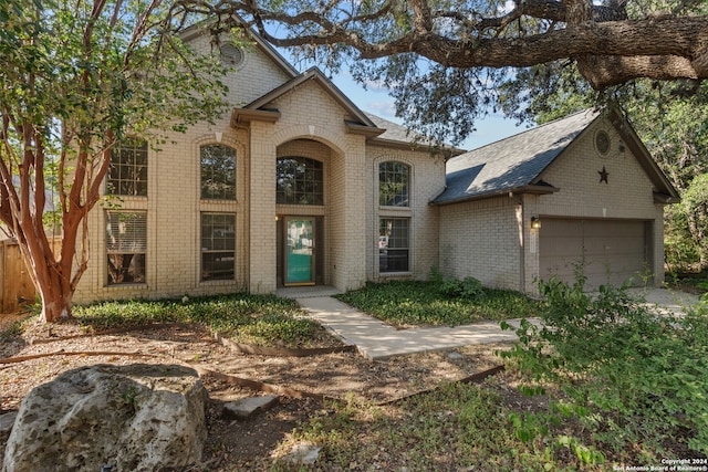 view of front of property with a garage