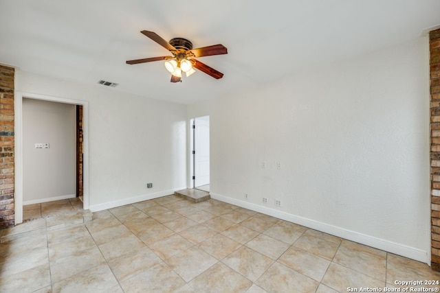 unfurnished room featuring light tile patterned flooring and ceiling fan