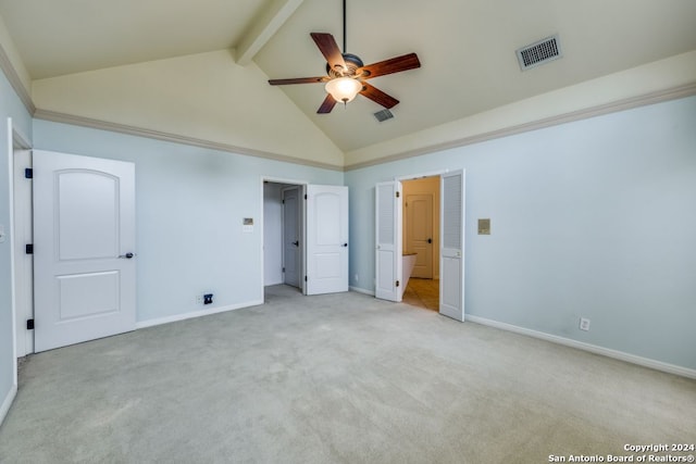 unfurnished bedroom featuring ceiling fan, beamed ceiling, light carpet, and high vaulted ceiling