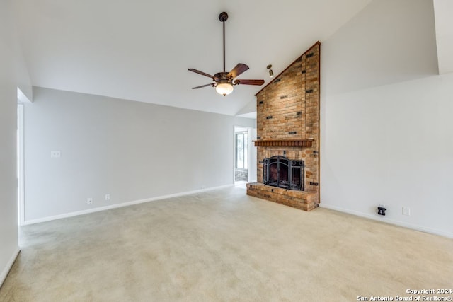 unfurnished living room with a fireplace, ceiling fan, high vaulted ceiling, and light carpet