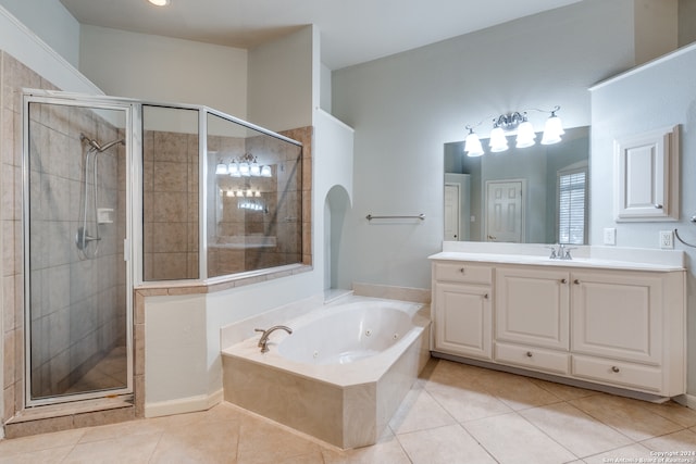 bathroom featuring separate shower and tub, tile patterned floors, and vanity