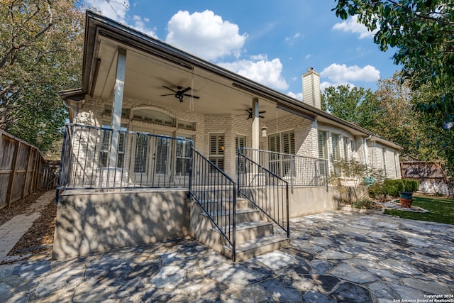 view of front of house with a patio area and ceiling fan