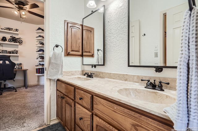 bathroom featuring vanity and ceiling fan