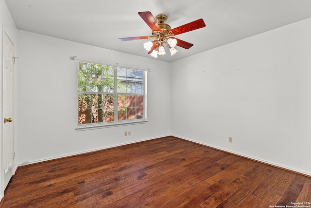 unfurnished room with ceiling fan and wood-type flooring