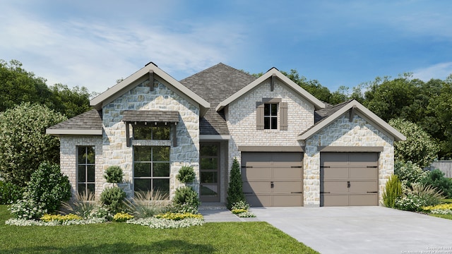 view of front of home featuring a garage and a front yard