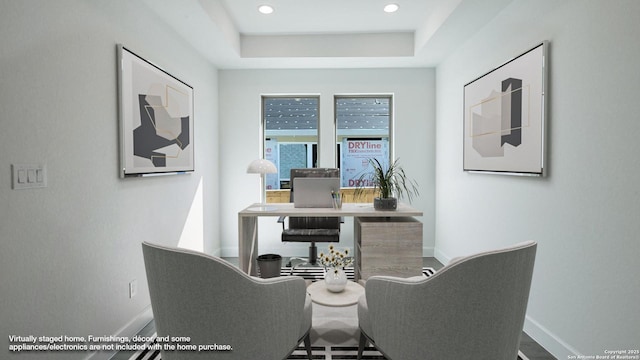 office featuring a raised ceiling