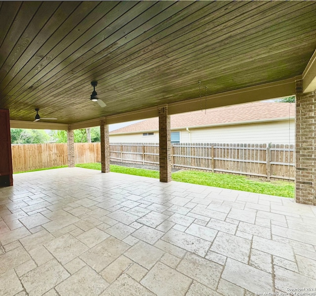 view of patio featuring ceiling fan