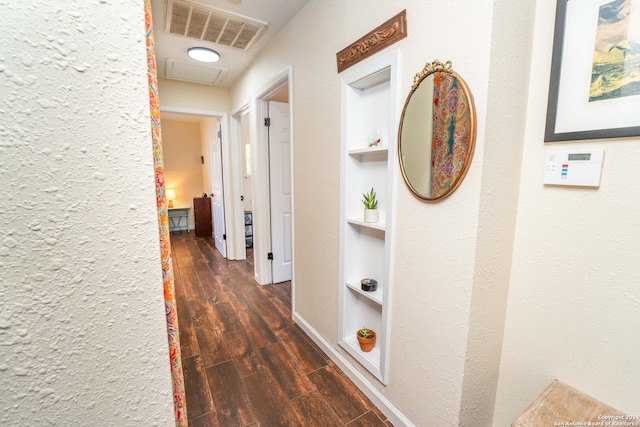 hallway featuring dark wood-type flooring