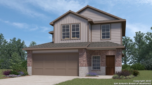view of front facade with brick siding, an attached garage, board and batten siding, and driveway