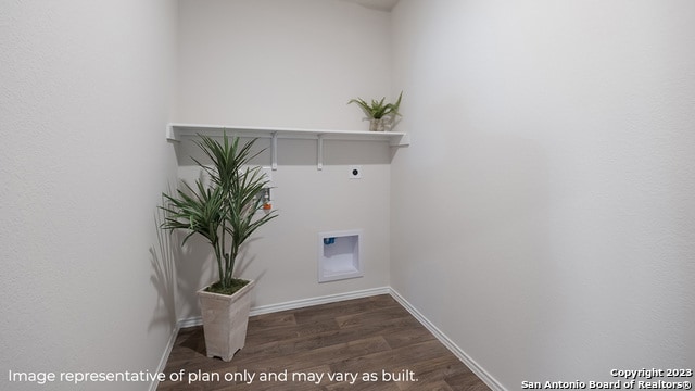washroom with laundry area, dark wood-style flooring, baseboards, electric dryer hookup, and washer hookup