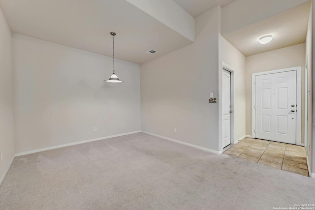 view of carpeted spare room