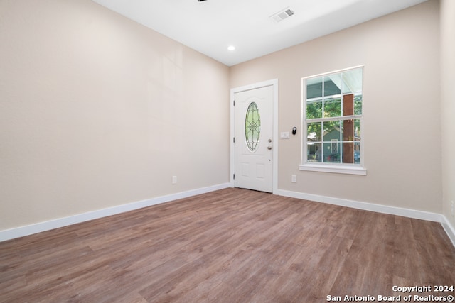 foyer entrance with hardwood / wood-style floors