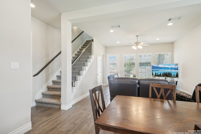 dining room featuring ceiling fan and hardwood / wood-style flooring