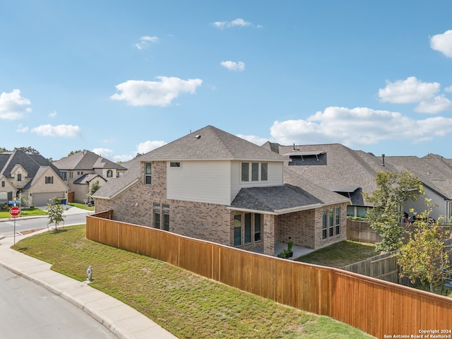 exterior space with a front yard